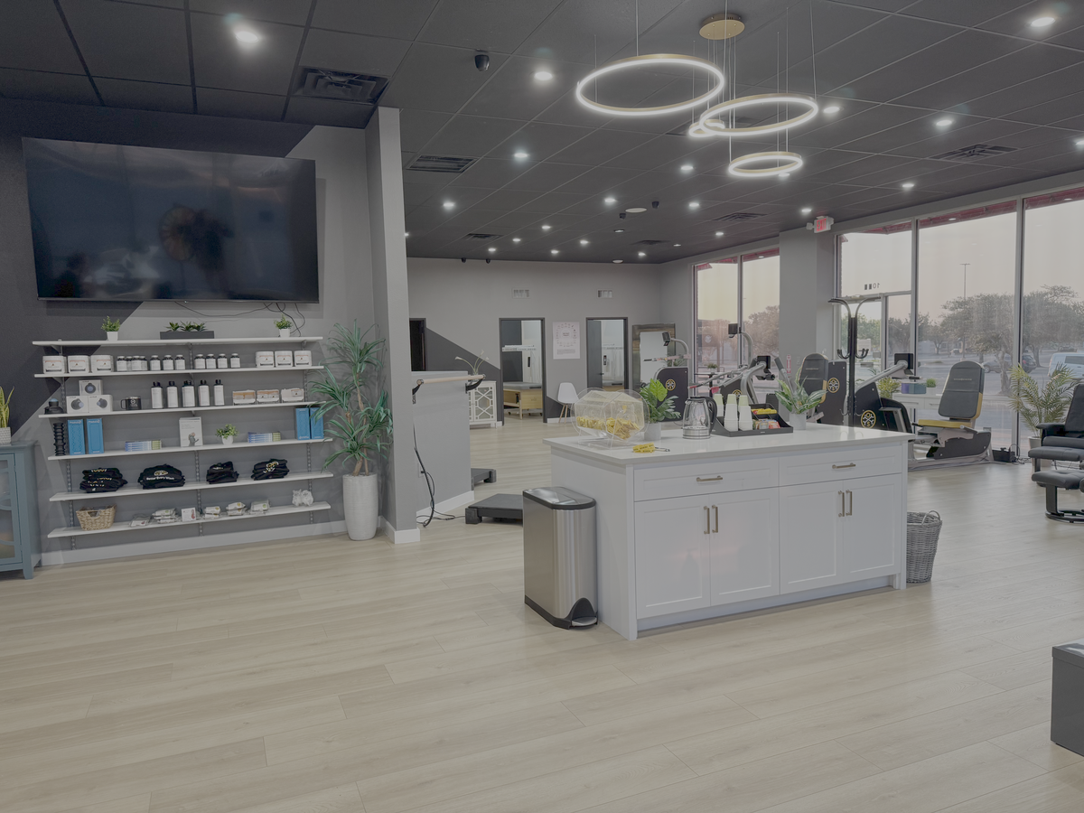 Inside the OsteoStrong center — a calm, modern, spa-like environment